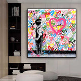 Banksy Wandbild kleines Kind mal bunte Herzen an Wand