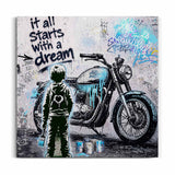 Junge betrachtet ein Motorrad im Street-Art-Stencil-Stil – It all starts with a Dream Wandbild auf Leinwand